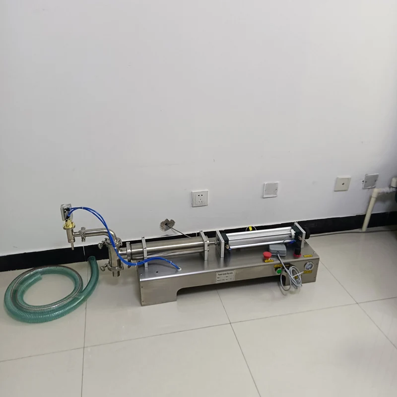 آلة تعبئة جديدة فوهة واحدة معدات تعبئة كمية سائلة 10-1000 مل آلة تعبئة السوائل من الفولاذ المقاوم للصدأ