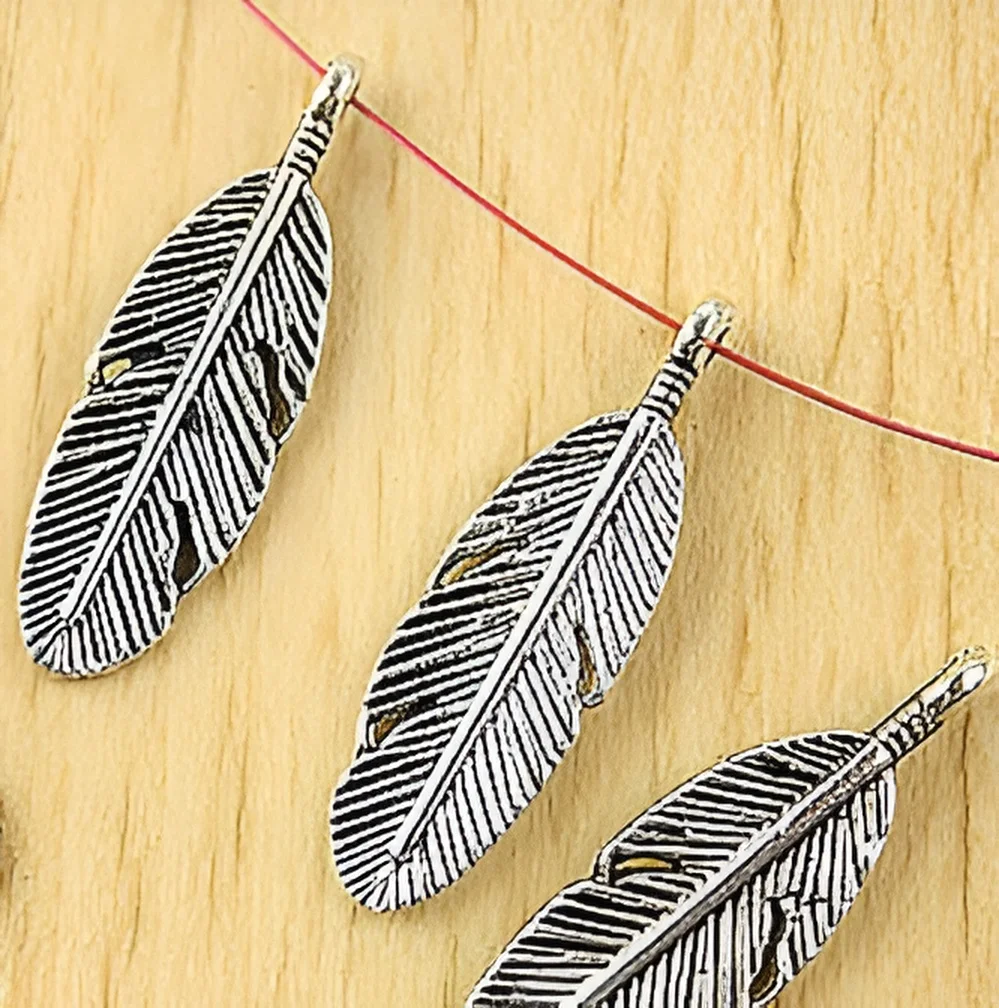 

20pcs 30*9mm Alloy matel tibetan silver 2sided feather charms HWH1747