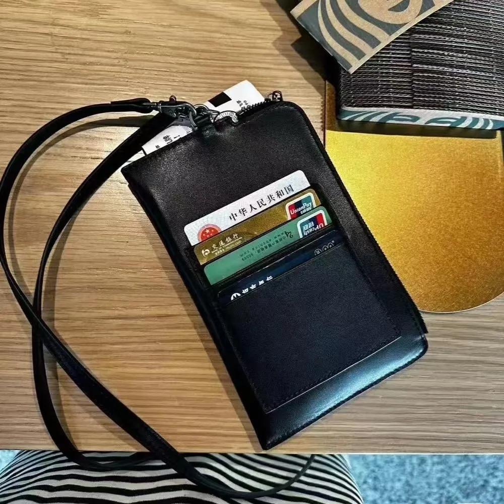 

The First Layer of Cowhide Passport Bags Convenient Mobile Phone Card Bags Multi-functional Change Bags High-end Sense Unisex