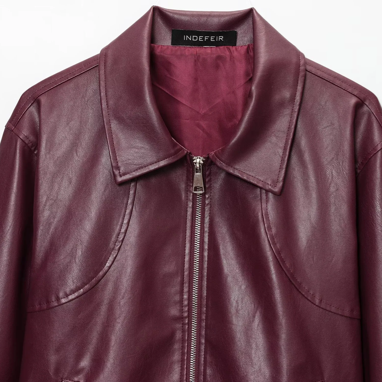 Giacca da donna in ecopelle stile retrò americano con risvolto dal design semplice per l'abbigliamento autunnale