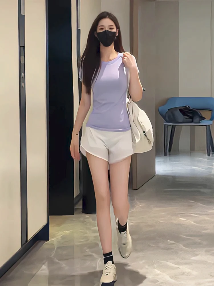 2025年フィットネスファッションスポーツウェアラウンドネックセーターとパンツのセット、スリムで若々しい印象の女性用カジュアルウェア