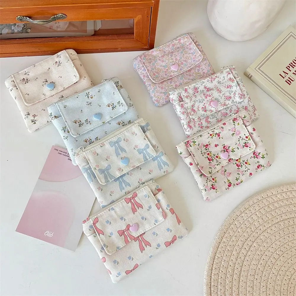 Mini portamonete multifunzionale in tela Borsa per imballaggio gioielli con fiocco Borsa piccola per rossetto Porta carte con stampa floreale