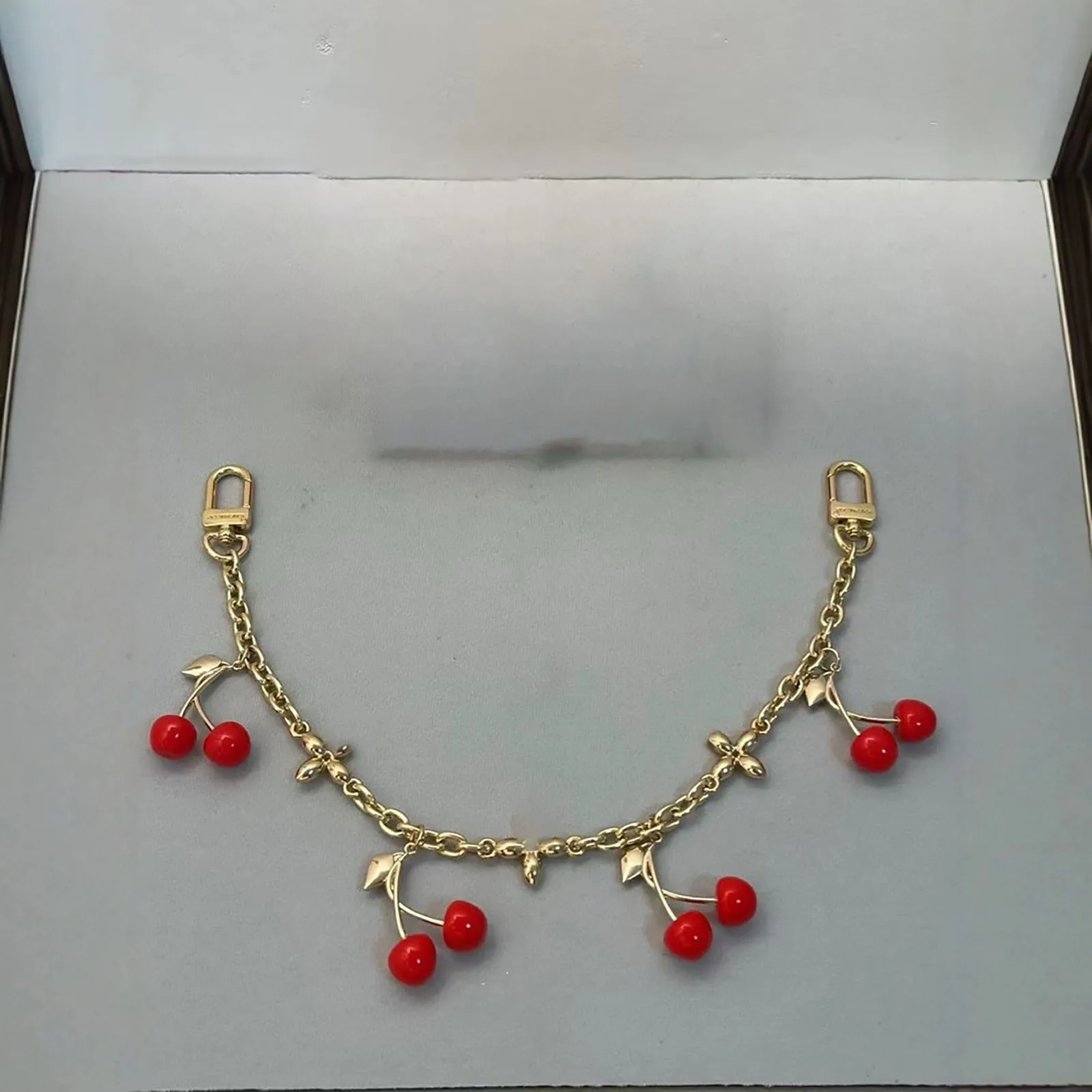 

Metal cherry bag pendant for men and women's waist chain
