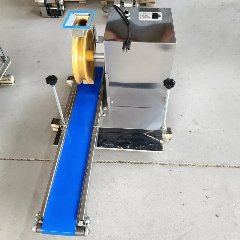 Macchina per arrotondare palline di pasta Macchina per arrotondare palline di pasta Macchina per arrotolare palline