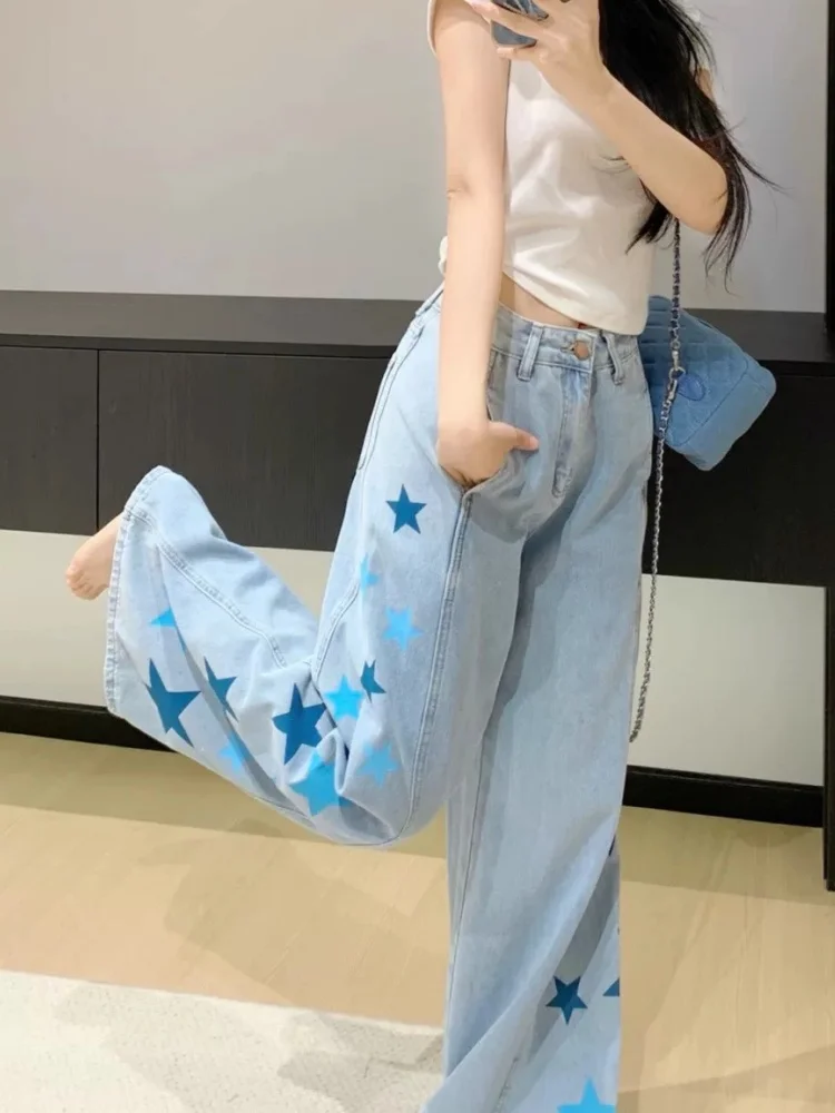 กางเกงยีนส์ผู้หญิงทรงแบ็กกี้สีน้ำเงินฟอกลายดาวสไตล์ Y2K ปี 2025 เสื้อผ้าผู้หญิงลำลองผ้าฝ้ายเดนิม