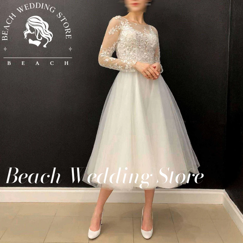 

Beach Customized A-Line Lace Garden Wedding Reception Outdoor Tea Length Long Sleevs Applique O-Neck Zipper Back High quality