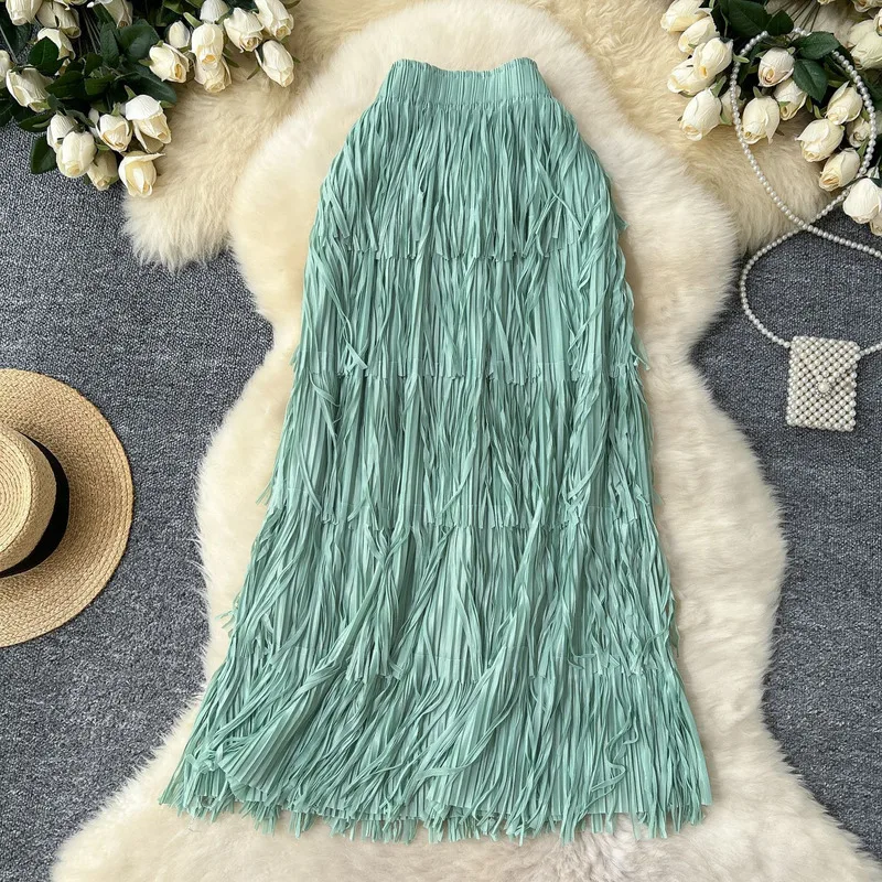 Novedad en 2025, falda larga por debajo de la rodilla con borlas para primavera y verano para mujer, ropa de calle de cintura alta a la moda, faldas informales