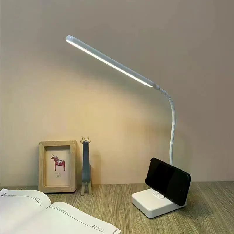 

Rechargeable LED Eye-Care Desk Lamp with 3 Color Modes, Dimmable Reading Light & Phone Stand for Home Office