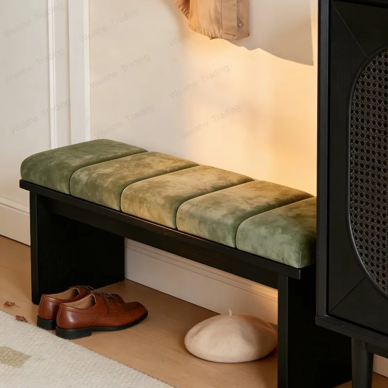 Entering the door to change shoes, household long sofa, bed, bedside stool, bedroom