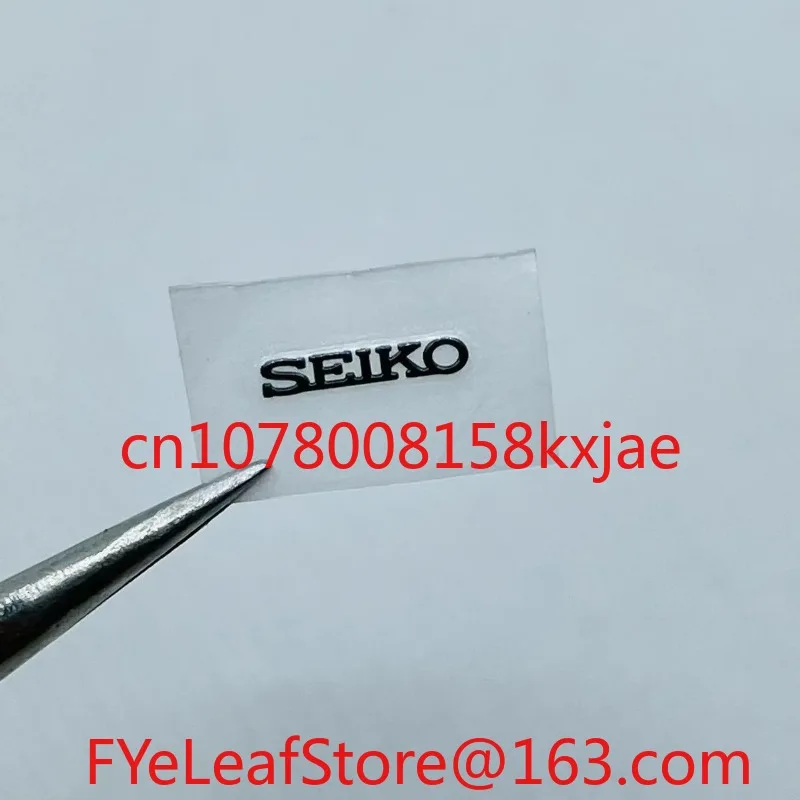 شاهد ترصيع الشعار الحرفي، وملصقات الشعار المعدنية، وملصقات الملصقات على شكل حرف S