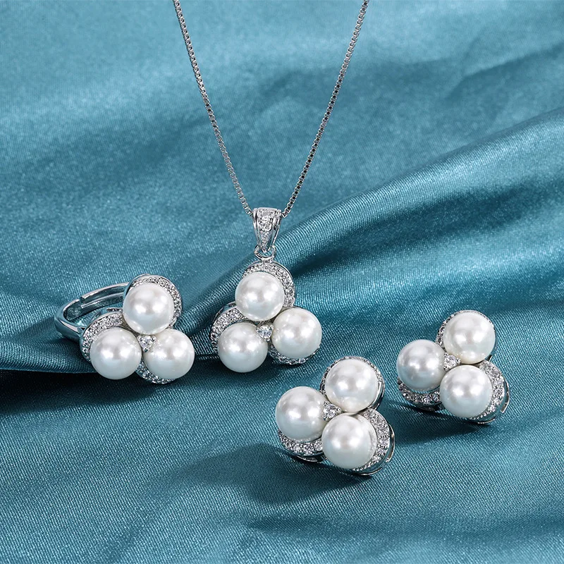 

Copper Gold-Plated Hot Style European and American Fashion Pearl Micro-Inlaid Diamond Earrings Ring Necklace Three-Piece Set for