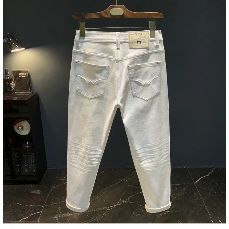 

Белые джинсы мужские, осенний стиль 2025 года, конические маленькие прямые эластичные элитные модные мужские повседневные брюки