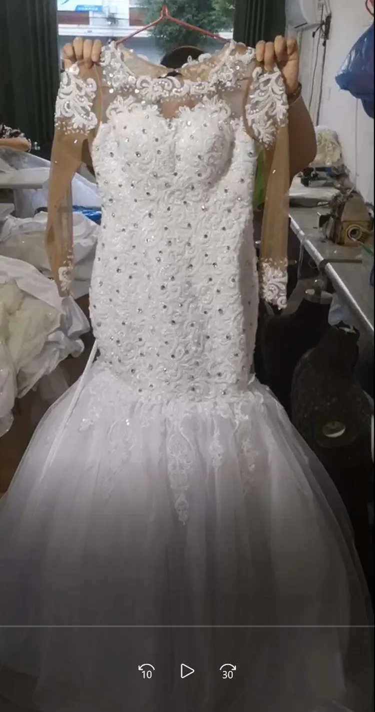 Abito da sposa a sirena con scollo rotondo personalizzato con applicazioni di cristalli pesanti Robe De Mariée Abiti da sposa a maniche lunghe con illusione africana