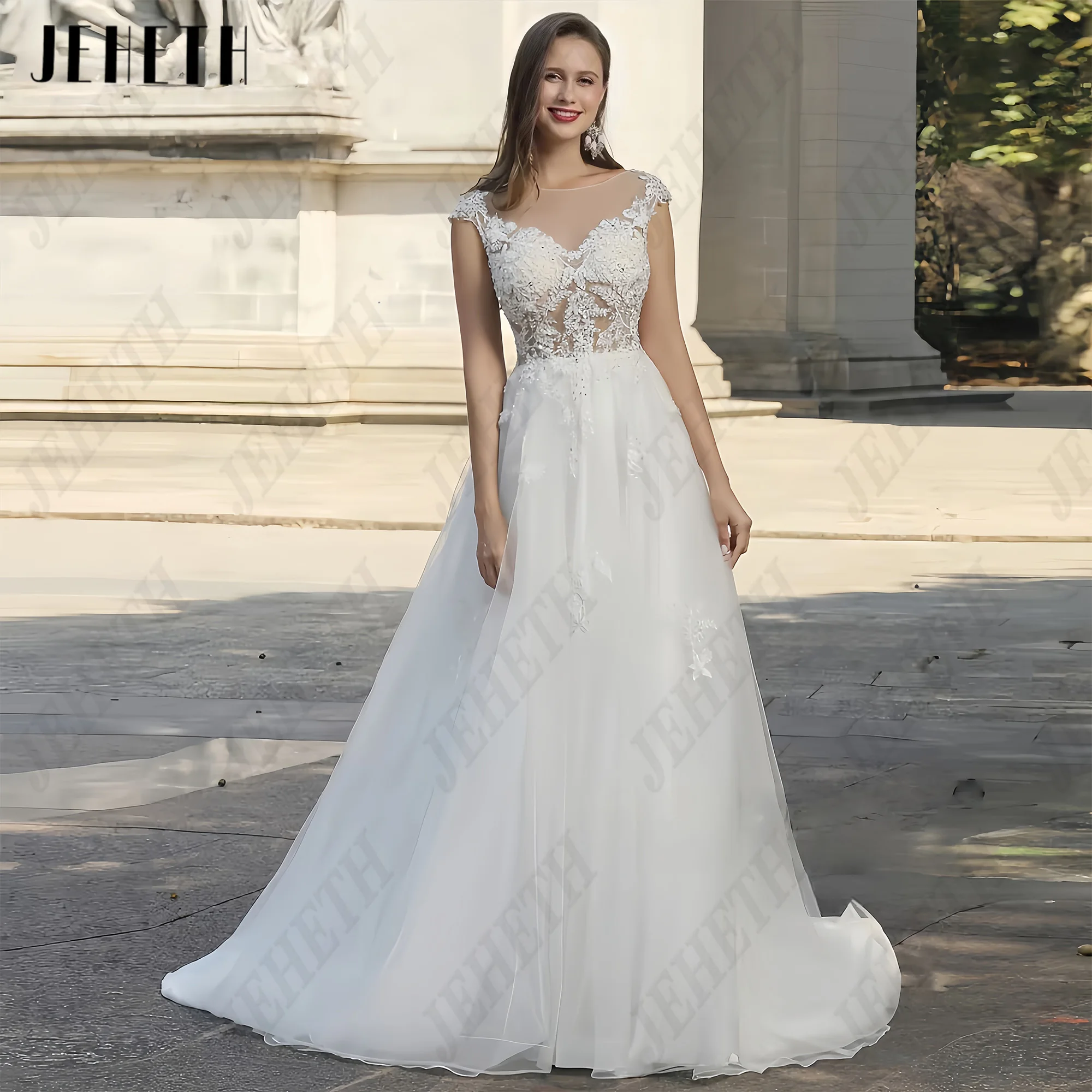 JEHETH A-line senza maniche Scoop Tulle Abito da sposa Decalcomania del pizzo Backless Lussuoso abito da sposa sexy Vestido 2025 Personalizzato JEHETH A-linea senza maniche Scoop Tulle abito da sposa pizzo decal senza