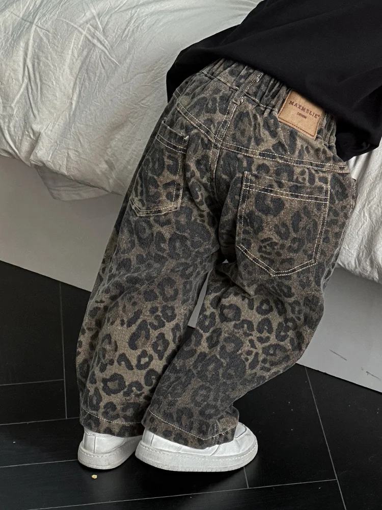 Pantalones largos de otoño para niños, pantalones vaqueros premium con estampado de leopardo, pantalones casuales versátiles y elegantes de otoño