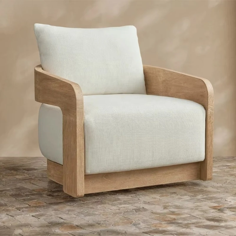 Modern teak swivel club chair with durable waterproof cushion, ideal for outdoor leisure—eco-friendly design
