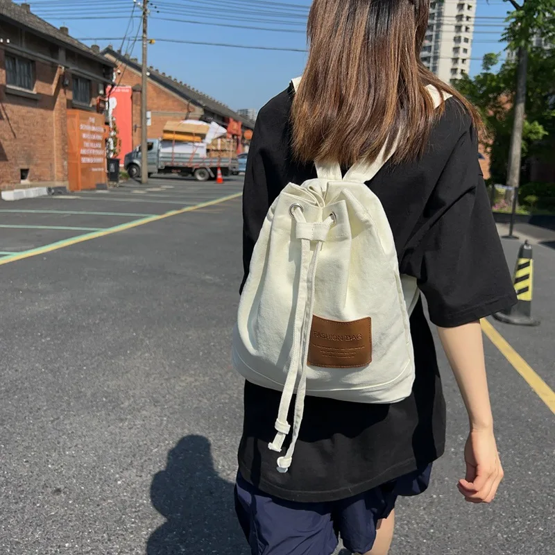 Bolsa de ombro de grande capacidade para mulheres, lona monocromática, mochila simples, moda com cordão, nova, 2024