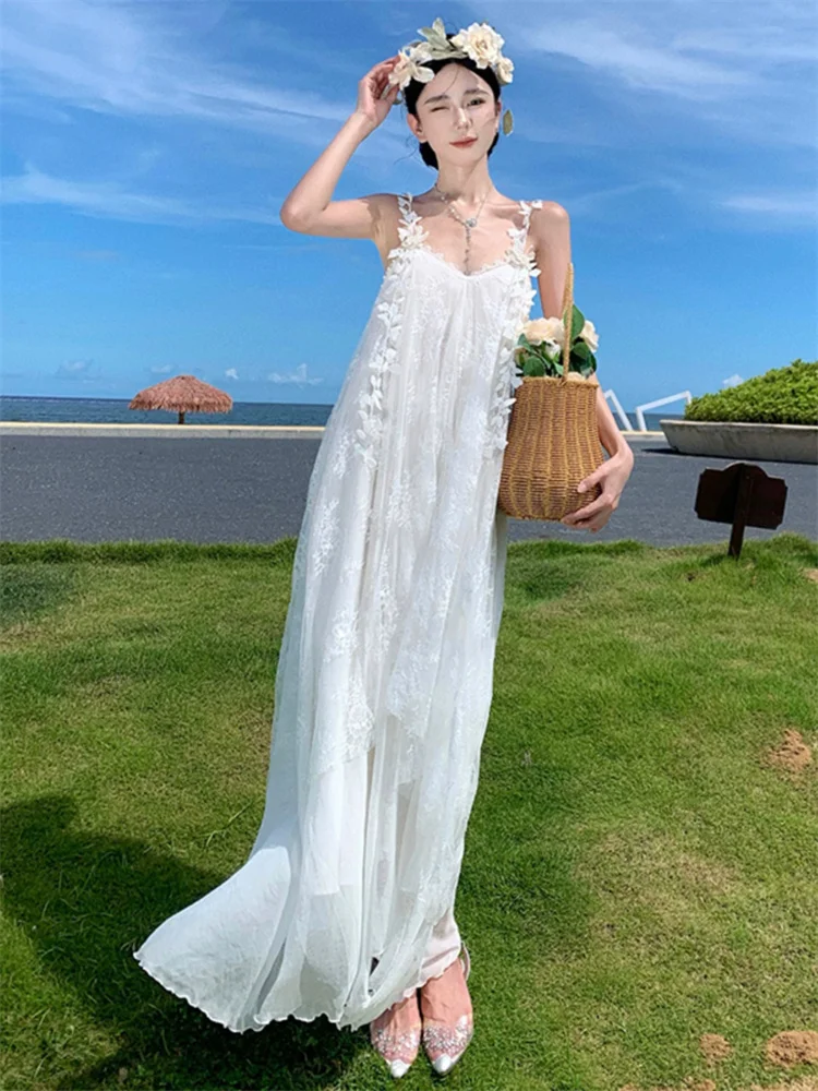 Robe de plage blanche Style Boho féerique pour femmes, maille brodée, bretelles papillon, longue robe en dentelle, sans manches, ample, vacances
