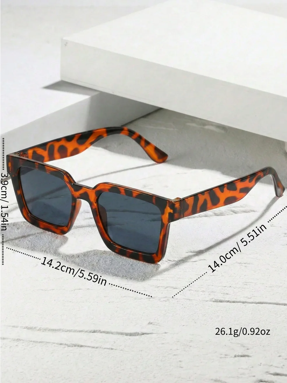 A pair of unisex square leopard print bohemian style fashion sunglasses, suitable for outdoor travel, driving, camping, daily wear, street photography, and dating looks. They are an ideal choice for summer beach vacati