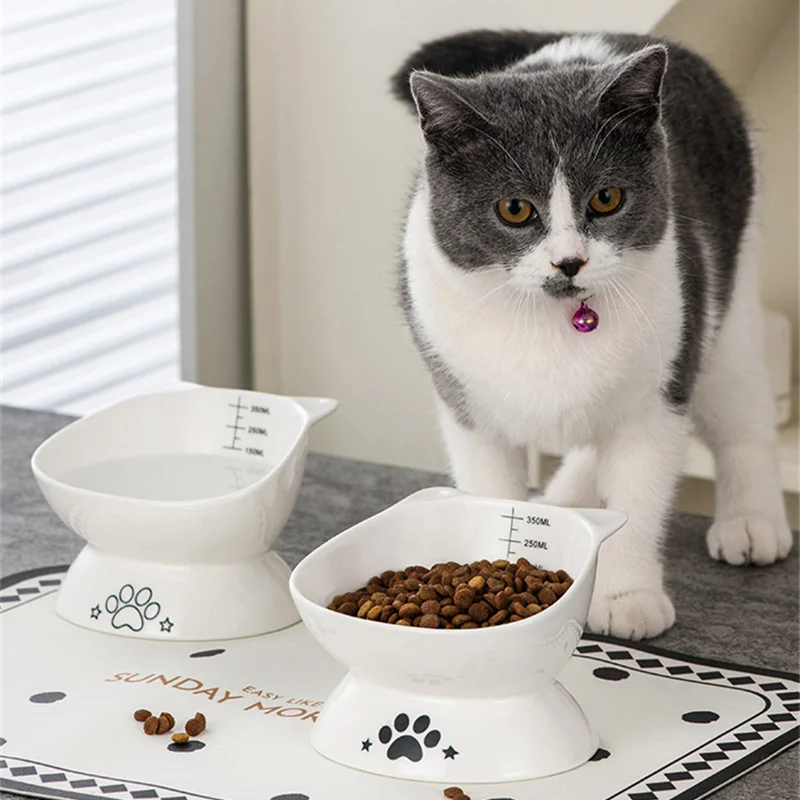 

Керамическая миска для кошек с дизайном в виде отпечатков лап, наклонная, для защиты шейных позвонков, кормушка для животных, поилка, зоотовары