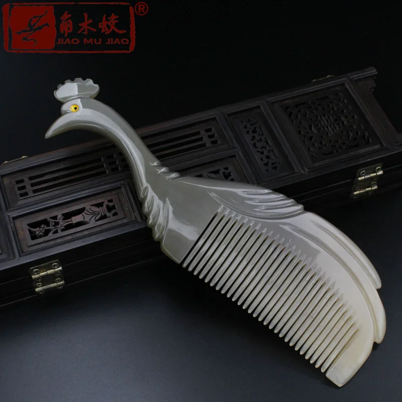 

Thickened model of comb made from horn of the horned dragon yak and peacock