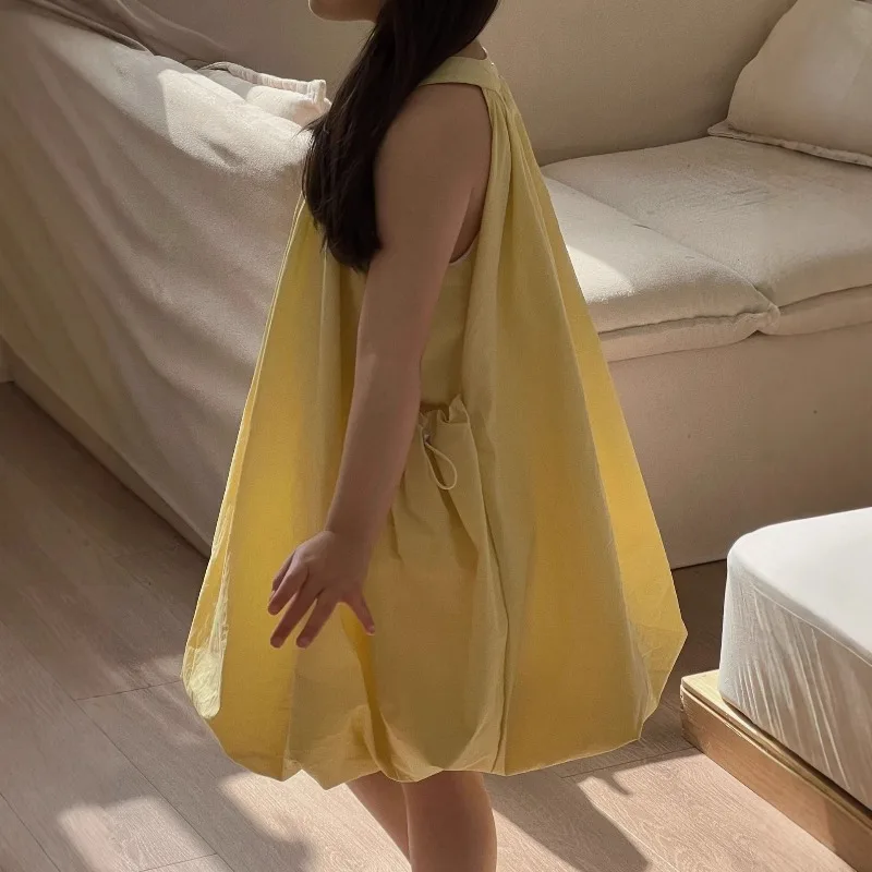 Girls' Dress 2026 Spring/Summer New Yellow Tank Top Skirt Korean Fashionable Girls' French Hanging Neck Flower Bud Skirt