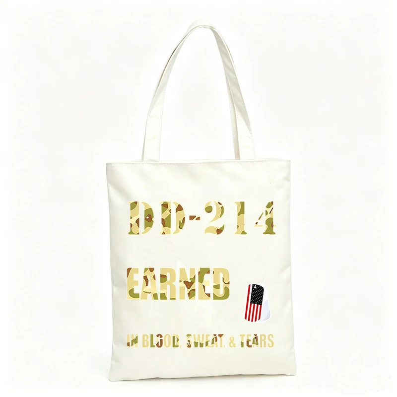 Veteran-inspired canvas tote bag with flag graphic and text print, ideal for daily use and casual outings