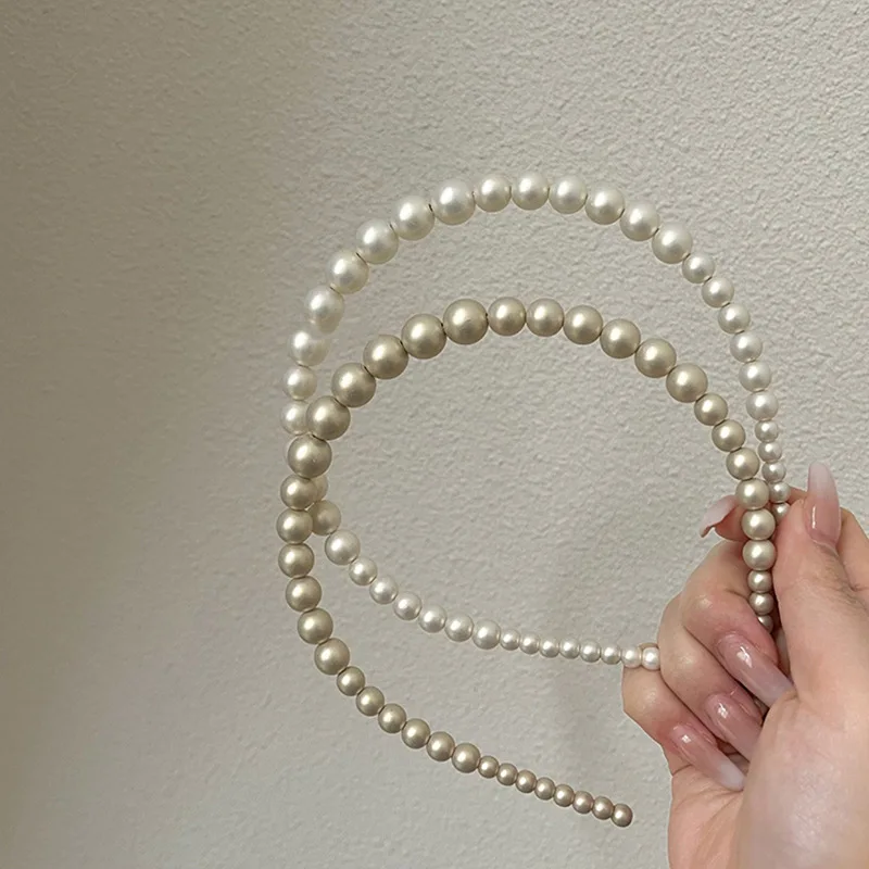 

Корейский стильный ободок для волос с крупными жемчужными бусинами, нежный и элегантный, универсальный аксессуар для повседневной носки и свадеб.