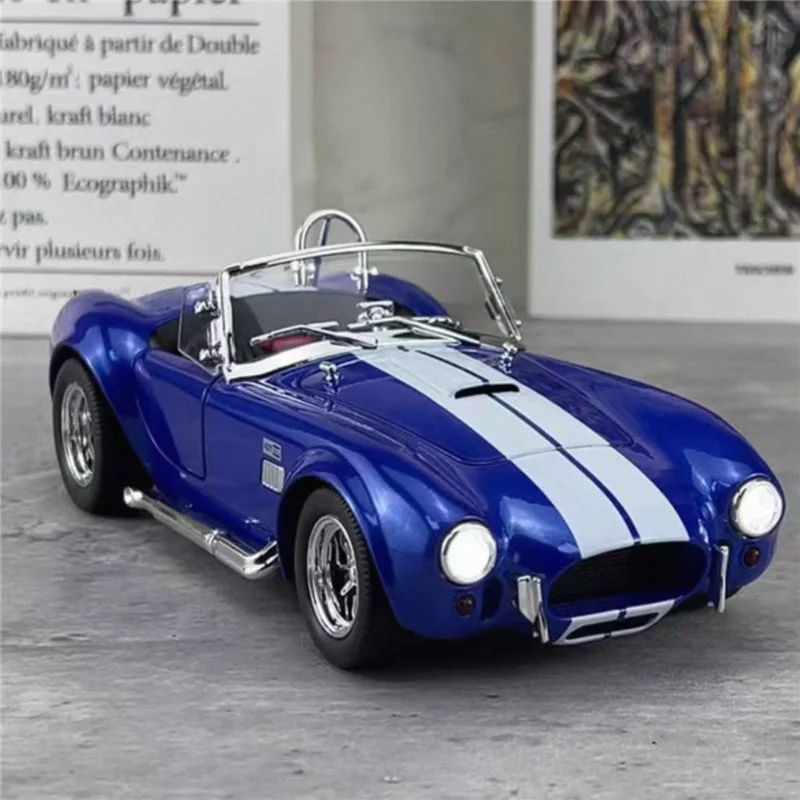 1:22 Shelby Cobra 427 S/C alliage Roadster modèle de voiture de sport en métal moulé sous pression classique rétro véhicule modèle de voiture son lumière enfant jouet cadeau