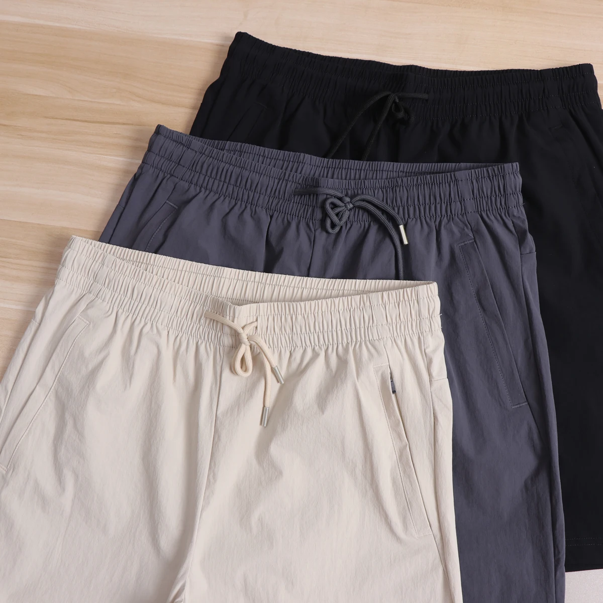 Outdoor Summer Cool Feeling Quick Dry Sports Shorts Breathable Moisture Wicking Drawstring Five-Quarter Length Casual Versatile