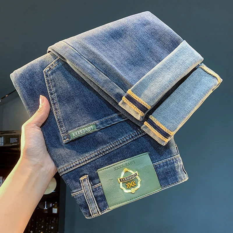 جينز رجالي راقي جديد لعام 2025 أزرق صغير مستقيم الساق غير رسمي فاخر الاتجاه بقصة ضيقة سروال طويل مرن مغسول