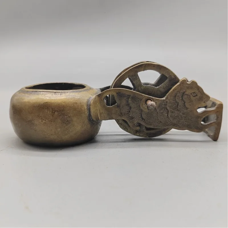 Antique miscellaneous items: old leather shell brass , copperware crafts, woodworking line marker, tiger head ink mark