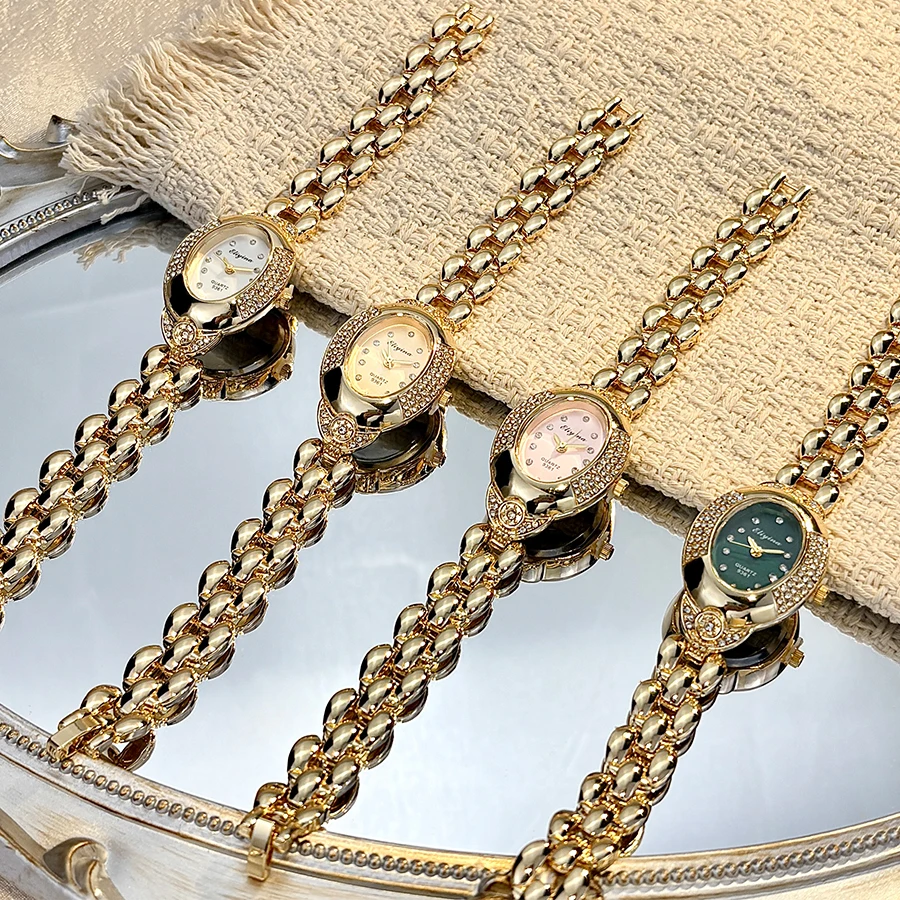 Exquisite Vintage Oval-Faced Watch with Delicate Gold Bead Bracelet & Sparkling Embellishments for Ladies