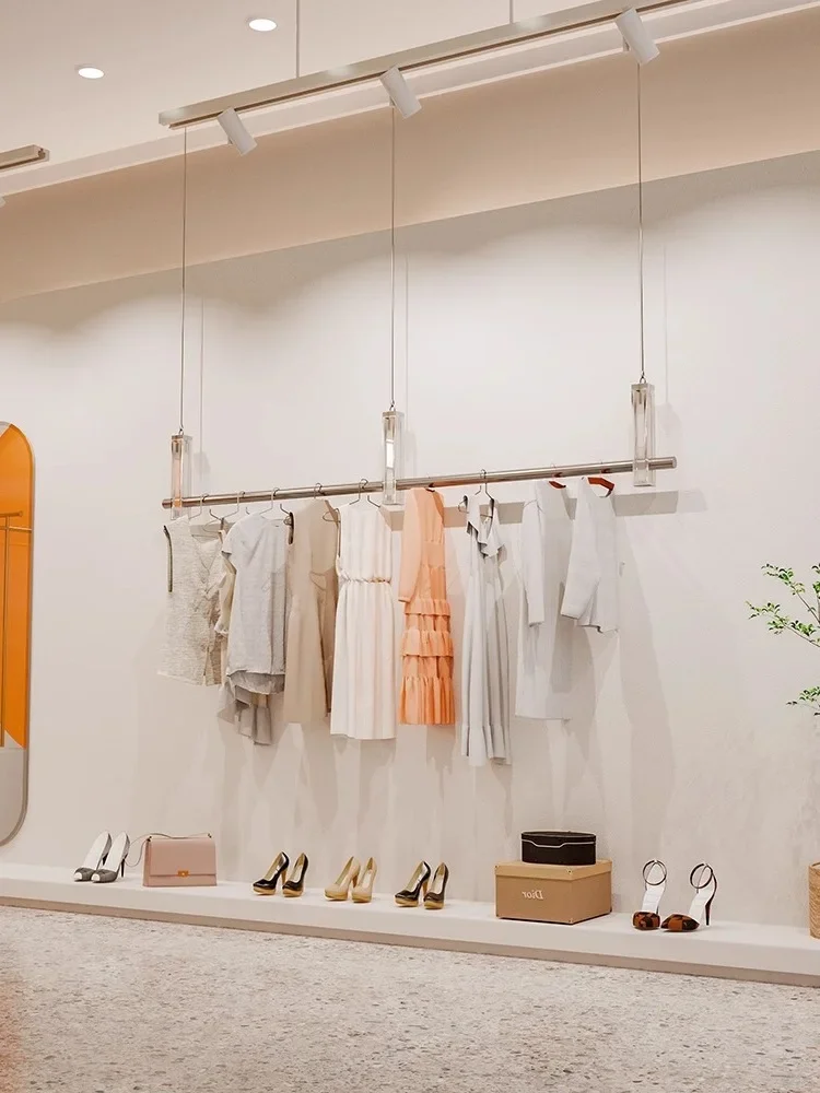 

Clothing store display rack stainless steel with acrylic ceiling hanging rod steel wire hanging hanger window display shelf