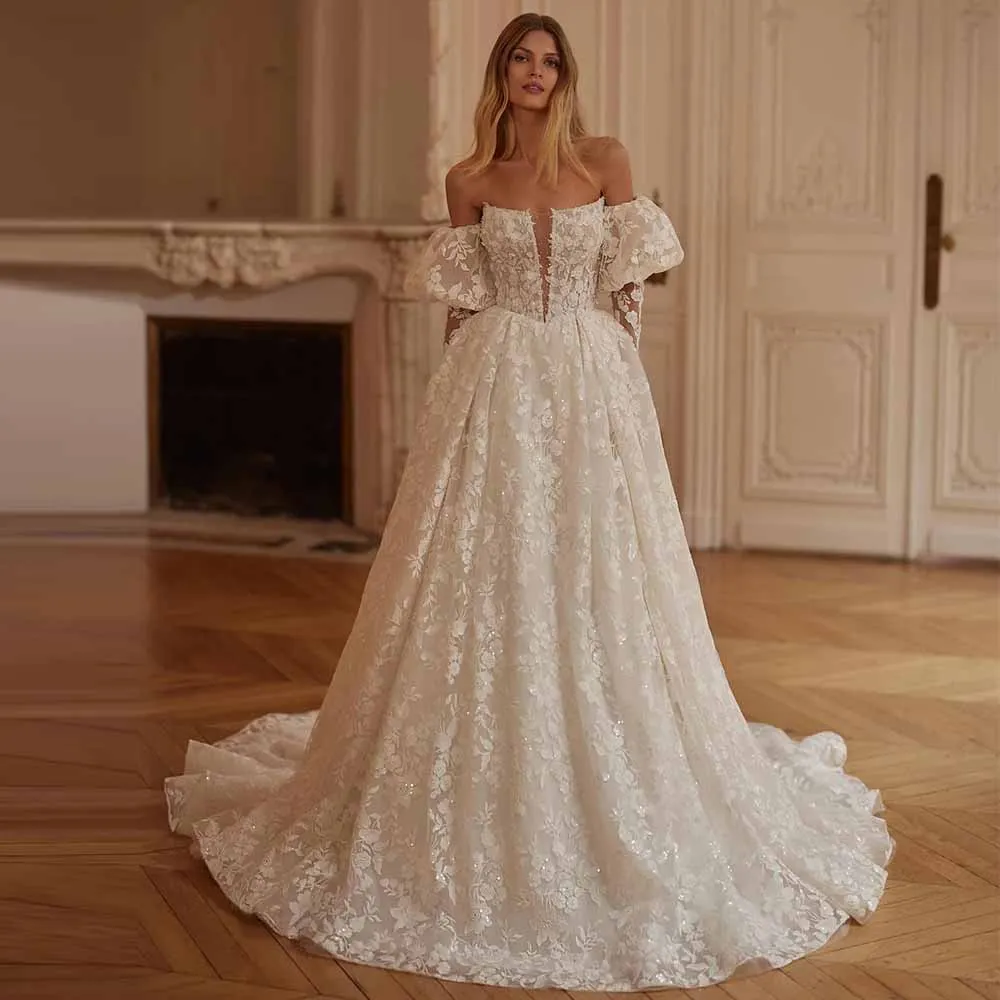 Pastrol Vestidos de invitados de boda Vestidos de fiesta de boda de una línea de encaje Vestido de novia fruncido con cordones y mangas abullonadas con hombros descubiertos de color marfil