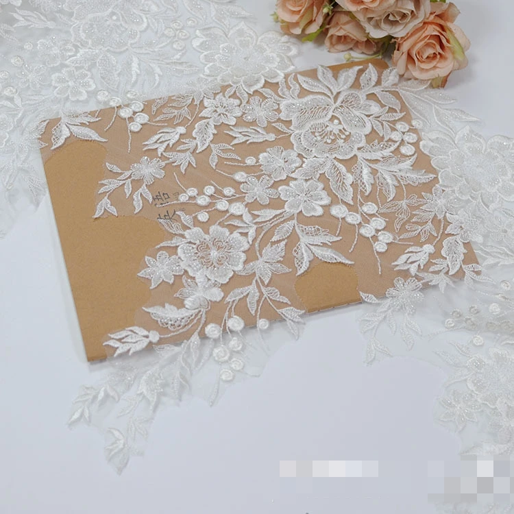 ลูกไม้หอยเชลล์ขนาดกว้าง40ซม. สำหรับตัดเย็บงานแต่งงานสีงาช้างคุณภาพดี2023ปักมาใหม่