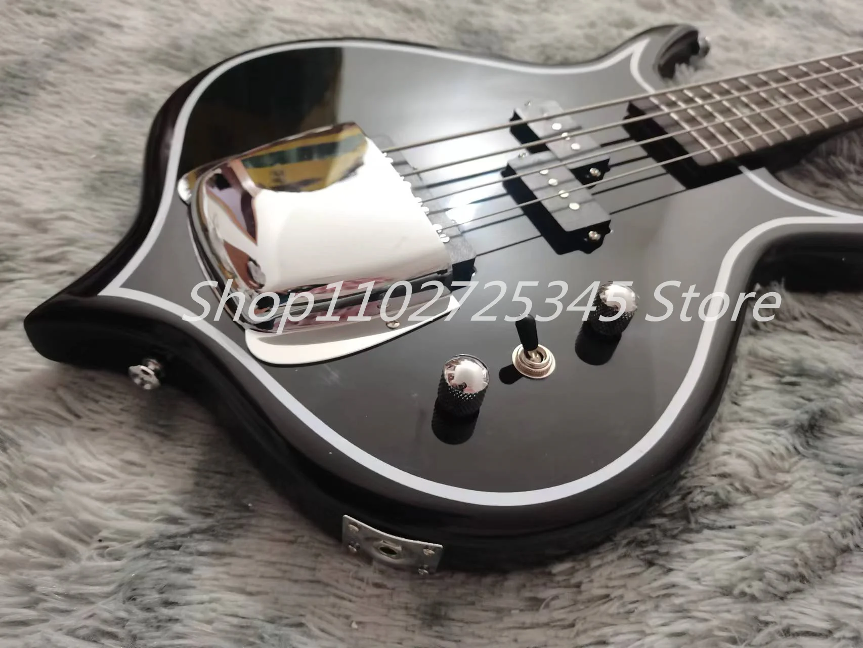 4 string bass, black paint, silver accessories, seller