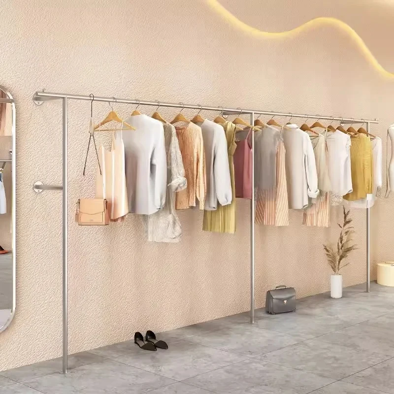 custom.Retail Clothing Store Metal Shape Shiny Gold Iron Pipe Wall Stainless Steel Display Rack  Showroom
