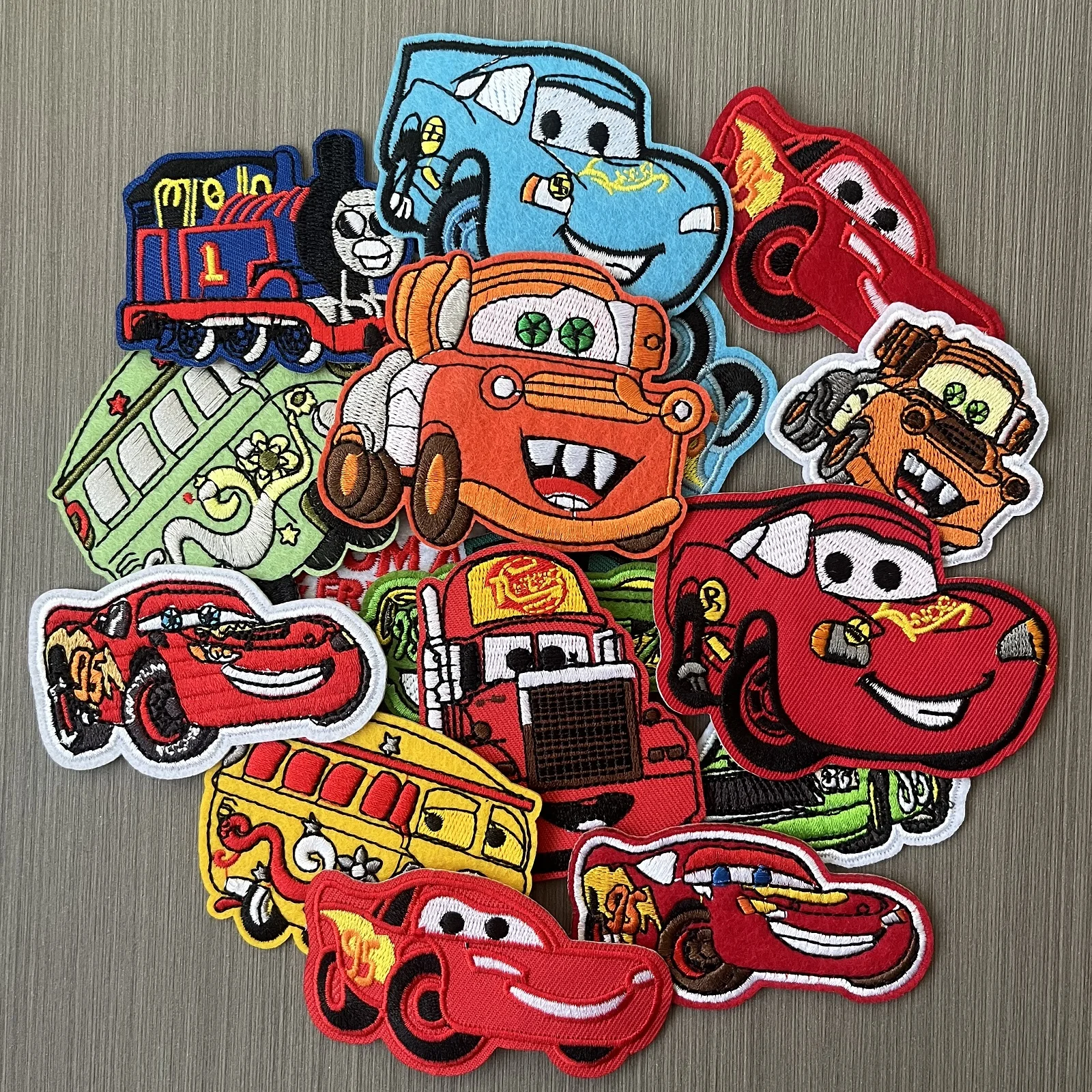 

17Pcs/Set Disney Anime Car For Sew Child clothing iron on Embroidered Patches Decor Clothes ironing Stickers Applique wholesale