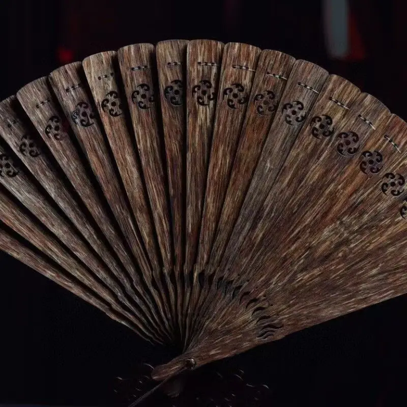 

Vietnam nha trang incense folding fan qinan high grease black oil old material hollow fan retro craft ornament fan genuine