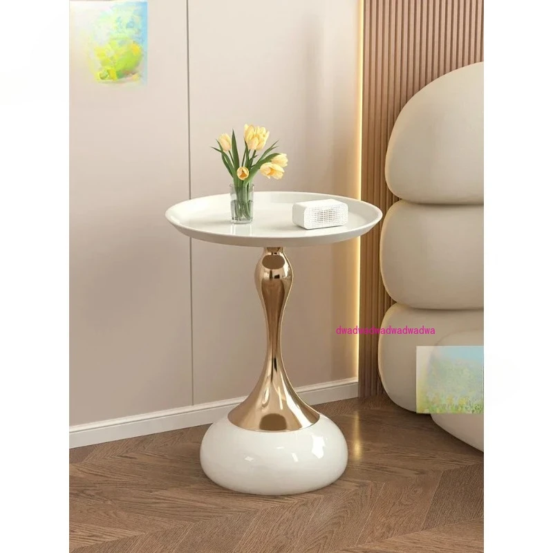 

Wrought iron bedside table, small coffee table, light luxury, high sense of creativity, cream wind, several shelves beside the s