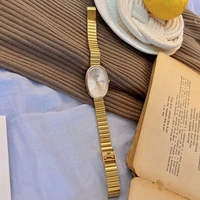 1pc nouvelle montre pour femme à la mode avec Bracelet en or, Style Ins Vintage et de luxe, montre à Quartz élégante et polyvalente montre pour femme 4