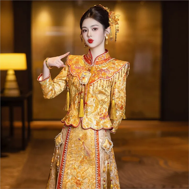 

The new style of heavy industry dragon and phoenix a Chinese-style wedding dress for brides toasting Malay