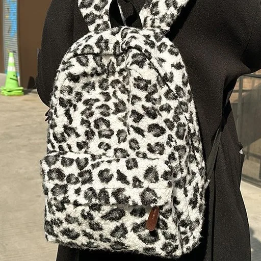 Y2K วินเทจตุ๊กตาเสือดาวพิมพ์กระเป๋าเป้สะพายหลังสำหรับสาวความจุขนาดใหญ่นักเรียนวิทยาลัยกระเป๋านักเรียนลำลองแบบพกพาสุภาพสตรีกระเป๋าสะพาย