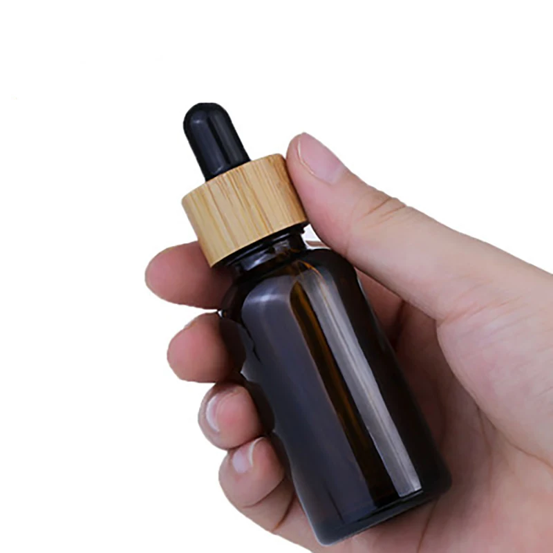 

5ml 10ml 15ml 20ml 30ml 50ml 100ml frosted matte Portable glass dropper bottle with bamboo lid cap dropper skin care essential