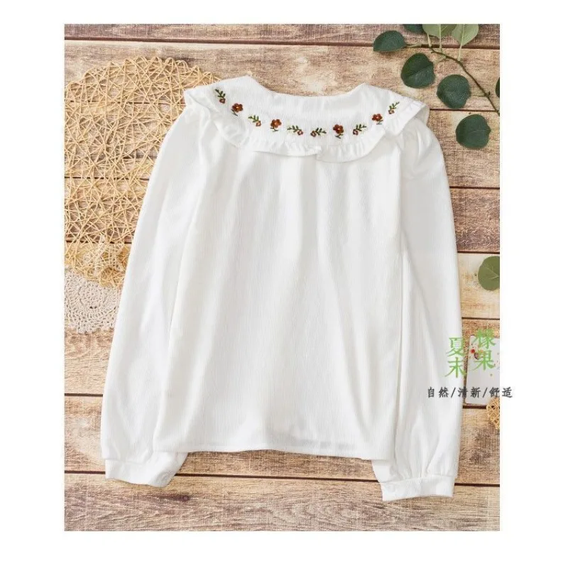 Chemise brodée à col de poupée pour femmes, haut à manches longues en velours côtelé à volants et lacets, nouvelle collection automne et hiver