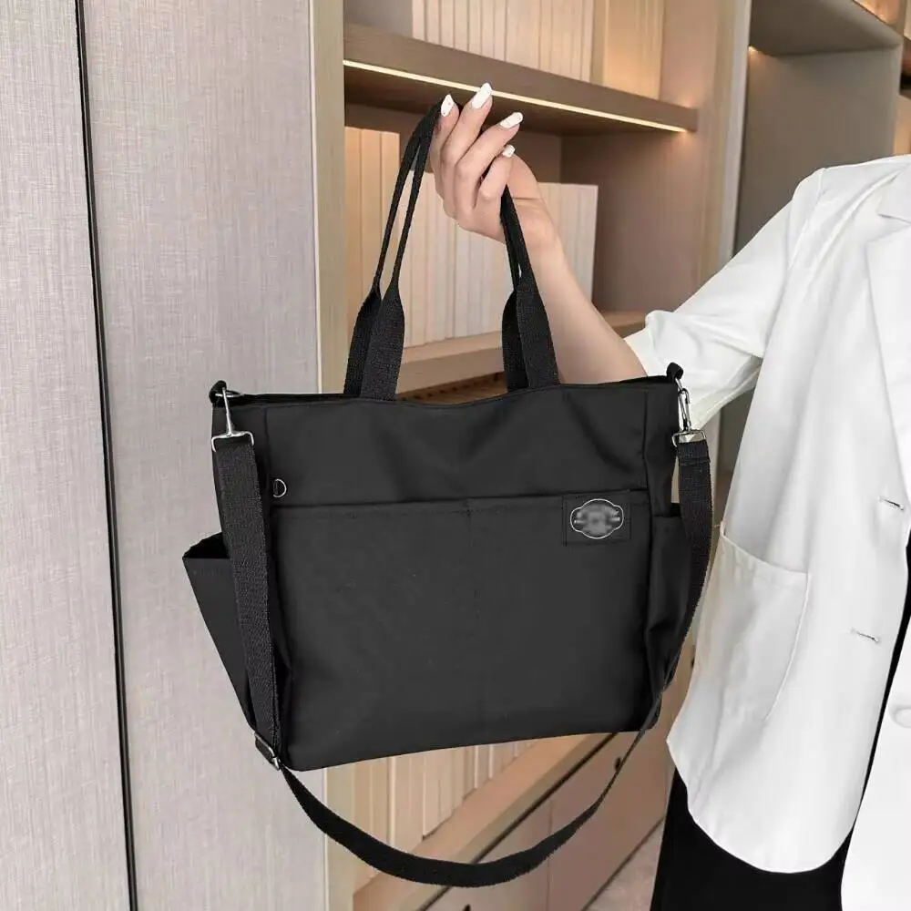 

A Tot Bag, Large Capacity Multi-Functional Multi-Pocket Leisure Sports Wind, Suitable For Young And Middle-Aged Use.