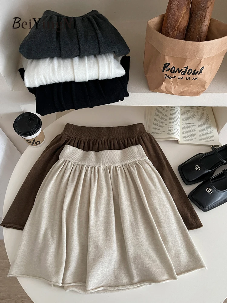 Beiyingni Donna Gonne a trapezio lavorate a maglia Tinta unita Moda coreana Elastico in vita Tutu Minigonna Francese Elegante Pianura Chic Gonne