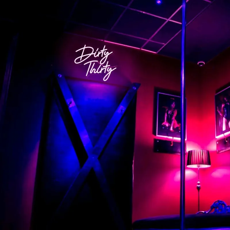 Dirty Thirty English letter neon lights illuminated words bar restaurant signage window decoration