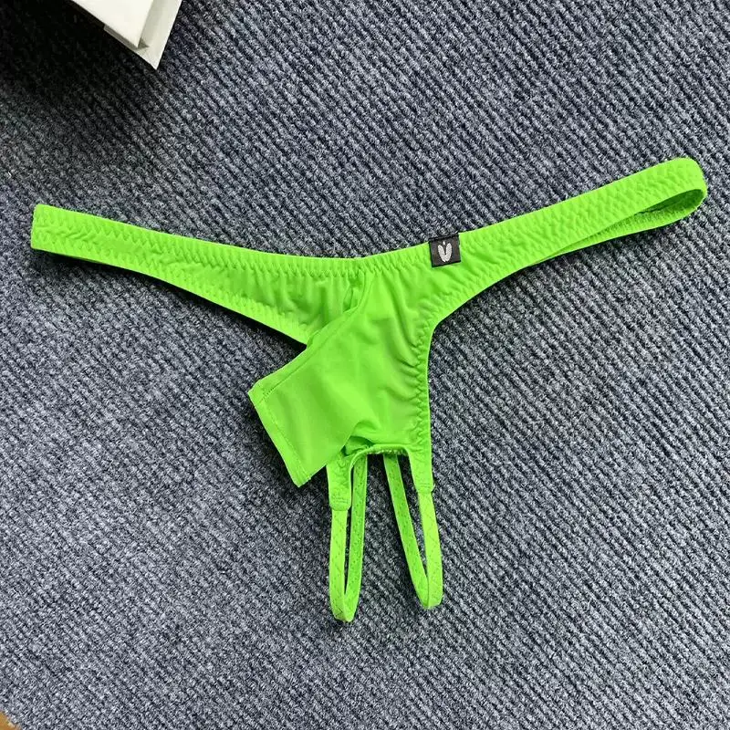 Men\'s Sexy Low Waisted Thong With Short Elephant Trunk Ice Silk Thin Cut Hollowed OutThin Straps Solid Color Underware
